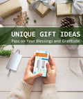 Hands holding Disco Ball Motor For Wind Spinner And Mirror Ball Chimes Hang Display Rotating Motor with gifts on table.