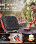 Bristle Free BBQ Grill Brush With 17 Inch Cool Touch Handle Steam Cleaner used on charcoal grill with family outdoors.