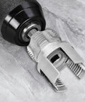 Close-up of a carbon steel internal and external pipe threading tool from All In One Pipe Threading Kit for Home Plumbing DIY.