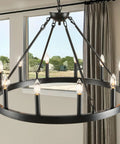 Top Tier 32 Inch Black Wagon Wheel Chandelier With 12 Lights sleek round design, displayed in bright room with natural lighting.