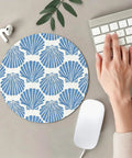 Blue Coastal Seashell Round Mouse Pad For Desk With Non Slip Base, Smooth Control, 7.9 Inch Diameter, shown on a beige desk