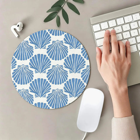 Blue Coastal Seashell Round Mouse Pad For Desk With Non Slip Base, Smooth Control, 7.9 Inch Diameter, shown on a beige desk
