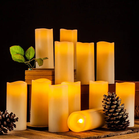 Flameless LED Candles Set Of 12 Ivory Real Wax Pillar Candles 2.2 Inch Diameter By 5 Inch Tall with pine cones and leaves
