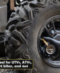 JACO Elite low-pressure tire gauge, 30 PSI, with brass chuck, close-up on ATV tire valve