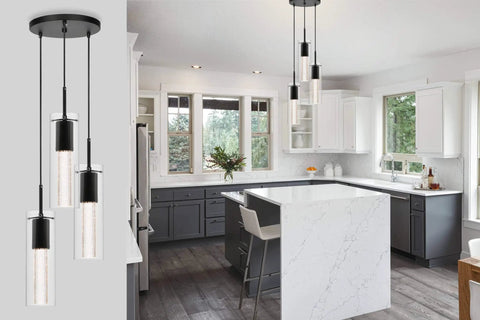 Three Light Kitchen Island Pendant In Matte Black Finish With Clear Glass Cylinder Shades And Bubble Crystal Orbs, LED Bulb Compatible, Modern 3 Light Cluster Fixture For Dining Room Or Kitchen Island With A Lit Vibe hanging over marble kitchen island.
