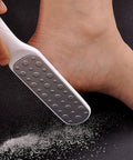 Easy At Home Foot Care Kit With Quick Peel Spray And Foot File Rasp For Callus Removal Three Minute Quick Fix Realistic Home Spa Pedicure Exfoliator Softener Heel Scrubber To Peel Dead Skin And Crush Calluses In Minutes showing foot file rasp in use on foot