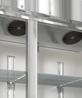 Inside view of Built To Last Straight Up Heavy Duty Three Door Stainless Steel Commercial Reach In Refrigerator 72 Cubic Feet.