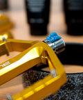Bike Assembly Grease That Keeps Your Ride Quiet And Smooth, Long-Lasting Lubrication applied on bicycle pedal threads.