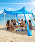 Pop Up Beach Canopy Sun Shelter With UPF Fifty And Ten By Ten Foot Coverage, Windproof Frame With Eight Sandbags And Stakes in use