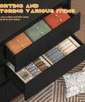 Open drawers of the Black Modern 3 Drawer Dresser For Bedroom And Living Room showing organized storage solutions with items inside.
