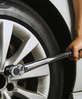 Using Half Inch Drive Click Torque Wrench Pro Grade With Ten To One Hundred Fifty Foot Pounds Range on car wheel lug nut