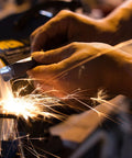 Heavy Duty Eight Inch Bench Grinder With A No Fuss Three Amp Motor and Soft Start Switch in action sharpening tools.