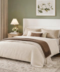 Game-Changing Queen Bed Frame With Dope White Velvet Wingback Headboard And Upholstered Platform Design Featuring Hardcore Metal Support And Thick Wood Slats For Solid Stability And Low-Key Luxury Vibes In Your Room, viewed with stylish bedding and decor.