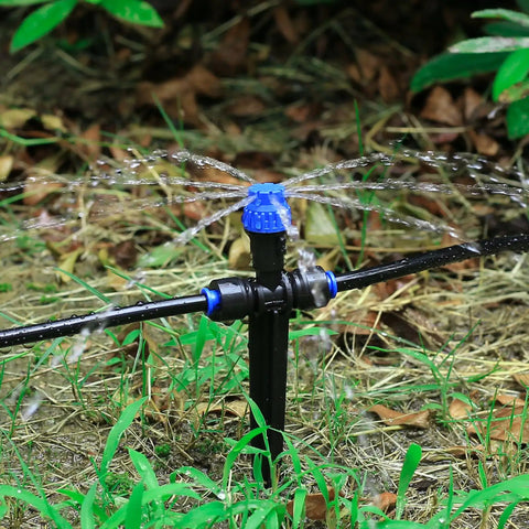 Adjustable 360 Degree Drip Irrigation Emitters For Quarter Inch Tubing Push To Fit Garden Drippers Sprayer 36 Pack installed in garden