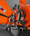 Close-up of WC68H 6 Inch PTO Hydraulic Wood Chipper components, showing hydraulic feeding for 20-50 HP tractors.