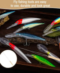 Assorted colorful fishing lures displayed on a wooden surface with a fly rod and text overlay on durability
