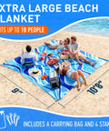 People relaxing on Waterproof Beach Blanket Sandproof 128 By 108 Inch Big Ol Portable Picnic Mat Fits Up To 10 People on a beach.