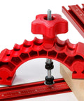 Knockout Rock Solid Micro Dot Drill Press Table Kit dual knuckle clamp with red adjustment knob on a drill press table.