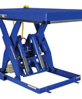 Heavy Duty Welded Steel Electric Hydraulic Lift Table With 48 By 72 Platform And 6000 Lbs Capacity Built Like A Brick House For Industrial Shops Osha Toe Guard Blue Finish, showing blue platform and hydraulic components.