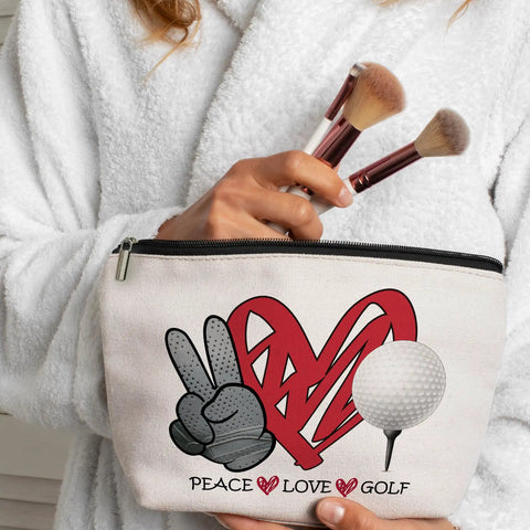 Woman holding Peace Love Golf themed makeup bag, linen cosmetic pouch, 9.8 x 7.1 in, travel toiletry organizer, golf design.