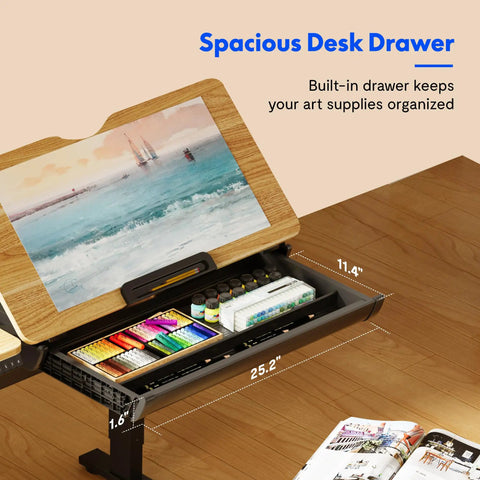 Flexispot Electric Drafting Table With Adjustable Height And Tilting Top 47.2 By 23.6 Inches Extendable Workstation with open storage drawer displaying art supplies.