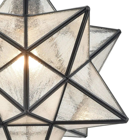Close-up of the 14 Inch Star Pendant Light With Seeded Glass Shade, showcasing its handcrafted modern star design.