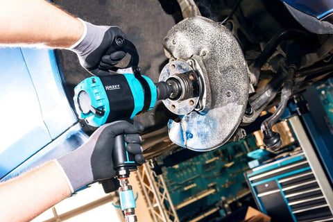 Tough As Nails Twin Turbo Air Impact Wrench With Compact Low Vibration Grip For Tightly Packed Engine Bays And Heavy Duty Truck Maintenance in use.