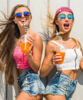 Two women with Mirror Disco Ball Straws Set For Party Decor Shiny Silver 70s Style Reusable Straws And Disco Ball Orbs Retro Cup Favors