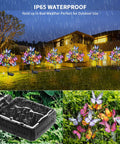 Solar Garden Lights Outdoor 2 Pack With 34 Butterflies And 44 LED Fairy Lights Waterproof Garden Decor showcased in rain