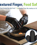 SWIFTLITE black nitrile gloves, large food-safe disposable gloves in use for cooking; textured fingertips inset.