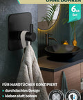 Top Shelf Black Self Adhesive Towel Hooks 6 Pack Stainless Steel Bathroom Wall Mount, holding towel in modern bathroom.
