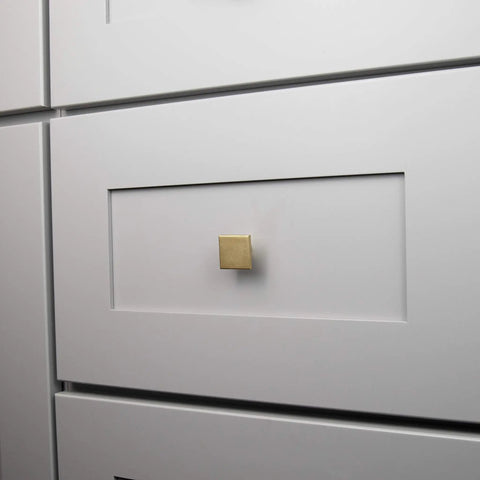 Square kitchen cabinet knob on white drawer, different finish than Square Kitchen Cabinet Knobs 10 Pack 1-3/16 Inch Matte Black Handles