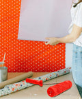 DIY Patterned Rubber Painting Roller For Textured Wall Art Decoration And Reusable Embossing Texture Tool That Creates Straight Up Stunning Wallpaper Vibes On Any Room With Minimal Effort beside floral wrapping paper.
