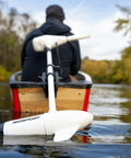 62lb Thrust Transom Mounted Saltwater Electric Trolling Motor with LED Battery on boat in calm water