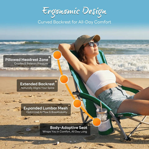 Person relaxing on a Low Profile Folding Beach Chair With Cup Holders And Carry Bag, showcasing ergonomic design on the beach.