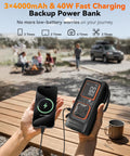 Hand holding a power bank charging a smartphone outdoors with a digital display showing battery level, people and a car in the background.