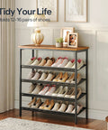 Five-Tier Entryway Shoe Rack With Adjustable Mesh Shelves Industrial Metal Design Holds 16-20 Pairs Of Shoes Floor Mount Rustic Brown Organizer For Closet Or Hallway, filled with shoes and decorated with items on top.