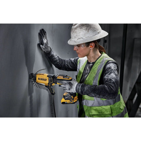 Worker using 20V Max Brushless Drywall Screw Gun Tool Only DCF630B with Variable Speed, Four Modes on drywall panel.