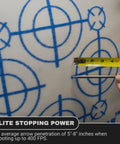 Close-up of Beast Archery And Crossbow Target Up To 400 FPS With Easy Arrow Pull showing penetration depth measurement.