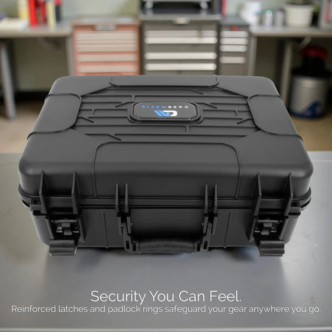 Front view of Hard Shell Wireless Microphone Case With Customizable Foam Insert For Sennheiser Shure Audio Technica Nady And VocoPro Receivers And Transmitters Built For Rugged Travel Gig Ready Protection showing black rugged exterior on a table.