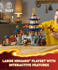 Teen building NINJAGO Tournament Temple City with moving water mill, pagoda model, part of 3489-piece set, Dragons Rising theme