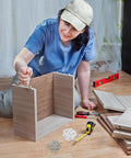 Person using Drawer Wedges With Screws Repair Kit For Sagging Furniture Bottoms, 50 Pcs Plastic ABS Drawer Support Wedges And Screws