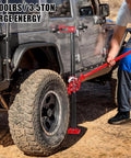 Man using 48 Inch Heavy Duty Farm Jack With 7000 Lb Lifting Capacity on gray SUV