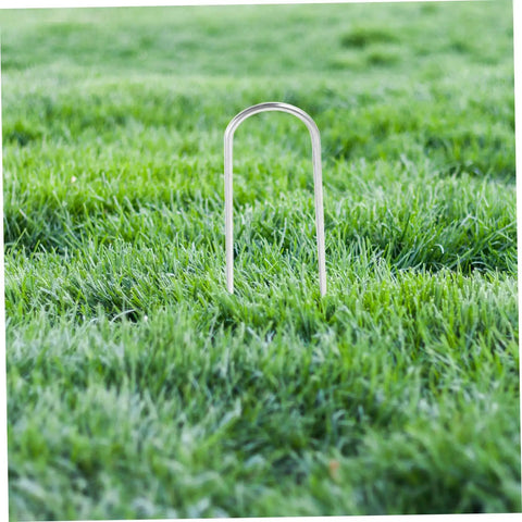 Heavy Duty Galvanized U Shaped Ground Stakes Pack Of 50 For Garden Membranes And Outdoor Fixes installed in grass