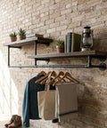 Industrial shelf with Half Inch By Twenty Four Inch Black Malleable Iron Pipe Nipples Fittings Ten Pack Threaded Both Ends With Rust Preventive Coating.