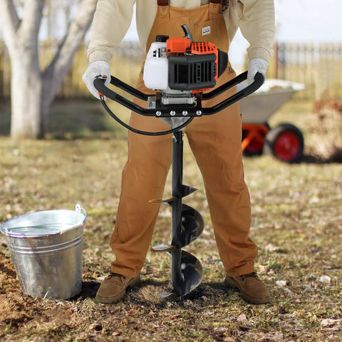 Person using Gas Powered Post Hole Digger With 43cc Engine And 8 Inch Auger Bit, 30 Inch Alloy Shaft in a garden