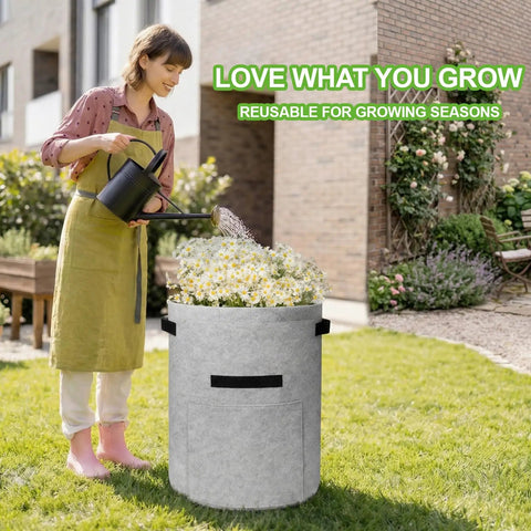 Person watering Potato Grow Bags With Flap 10 Gallon 4 Pack Planter Pots With Handles And Harvest Window For Potatoes Tomatoes And Vegetables