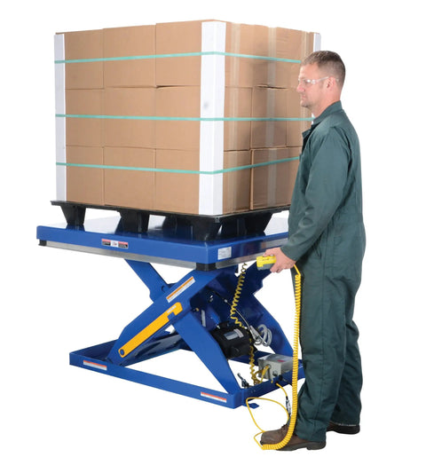 Rugged Electric Hydraulic Lift Table 48 X 48 Inch Steel Platform 5000 Lb Capacity with pallet and operator for loading.