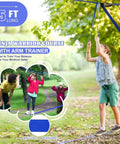 Child balancing on Backyard Kids Slackline Obstacle Course Kit With 65Ft Line And 13 Obstacles, trees in background.
