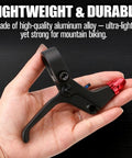 Pair Two Finger Aluminum Alloy Bicycle Brake Levers Universal 22mm, black lever held in hand, lightweight red component visible.